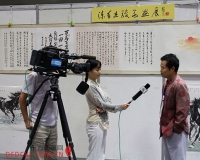 陈有杰百马图书画展日前闭幕