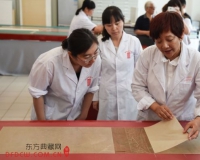 首都博物馆成功研制出生物酶揭展古书画技术