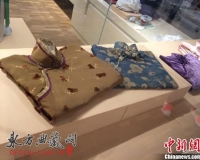 南京博物院展出百年旗袍:宋美龄等名媛珍藏引关注