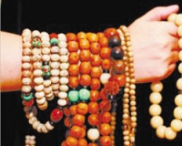 一颗蜜蜡老珠三年涨价9倍多:珠子假货居多