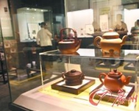 买紫砂壶要讲究诗书画印