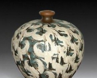 简述宜兴陶瓷装饰工艺的发展历史