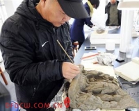 紧急修复文物:古代佛像享受现代SPA